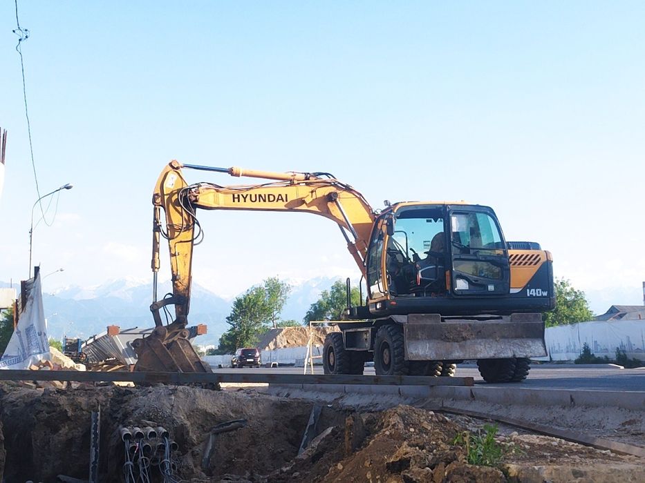 Услуги траншеекопател