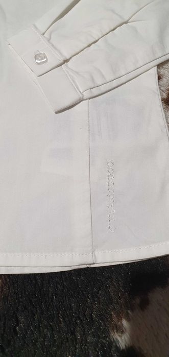 Бяла ризка с дантелка Coccodrilo р-р 2г