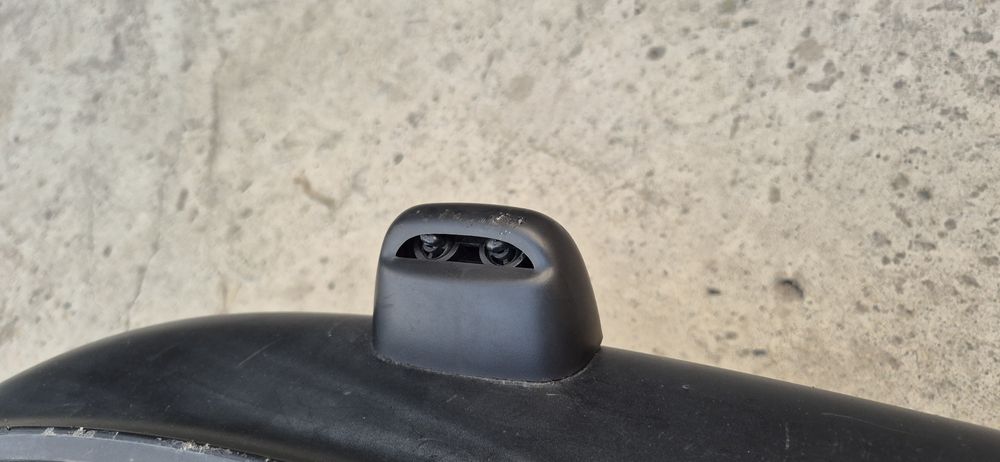 Бампер на Карину е  с амывательом фар