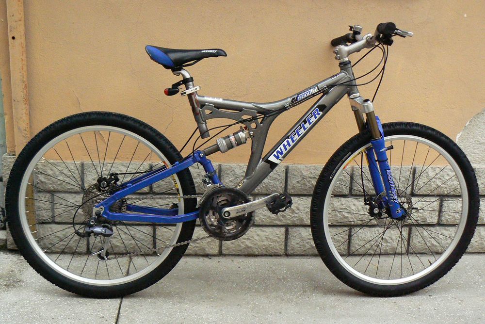 Bicicleta mountain bike de copii full suspensie Wheeler 26