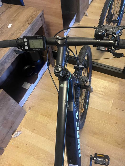 Bicicletă electrică Omega Liohult 29", sub 100 km, garanție până în august 2027
