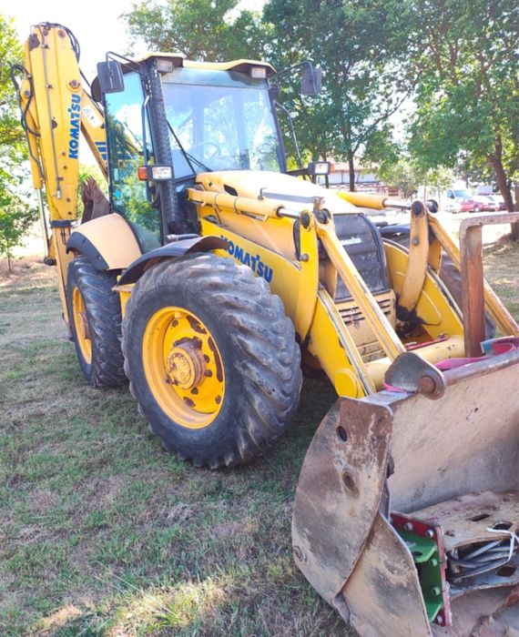 Багер Komatsu WB97S