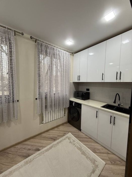 Чиланзар 2в3/2/5 ул.Мукими Дом вдоль дороги