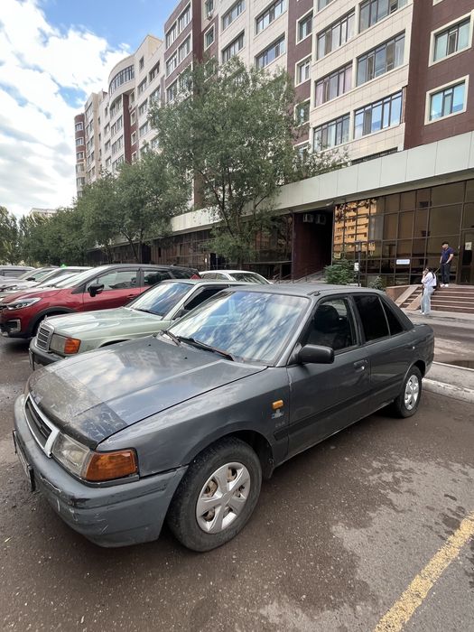Продам машину Мазда 323.