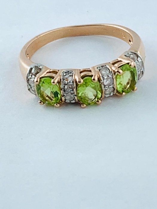 Redus  Inel aur 14 kcu peridot și diamante