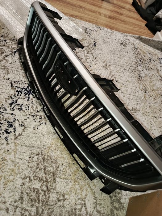 Geely emgrant решетка