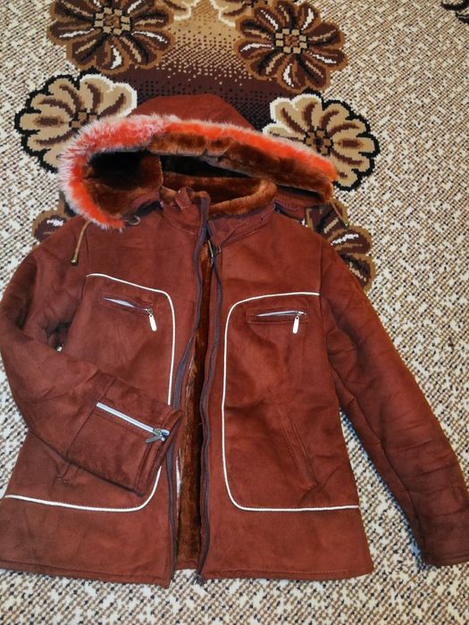 Bundiță îmblănită, foarte călduroasă și frumoasă.