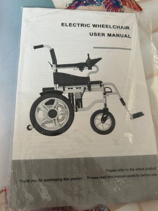 Электрическая инвалидная коляска