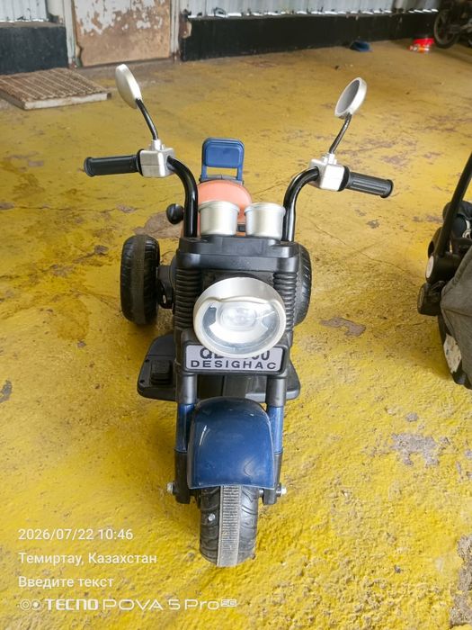 Продам Коляску детскую., столик и мотоцикл
