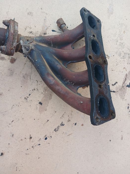 Коллектор Мазда 323 двигатель ZL