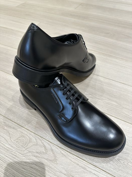 Оригинальные туфли от бренда Prada