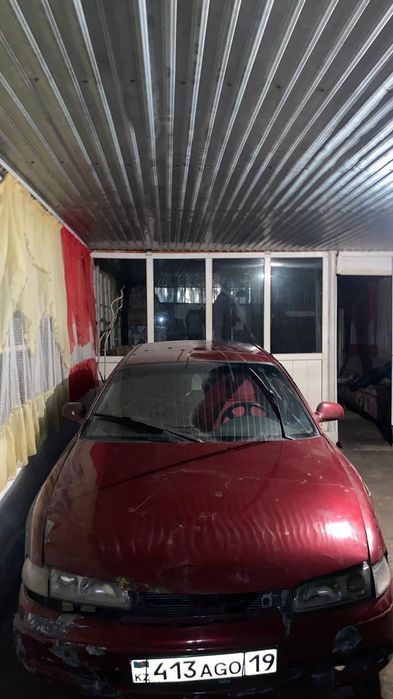 Мазда кронс красныи