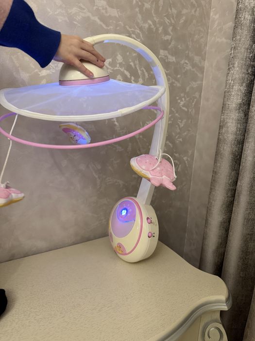 Музыкалтная игрушка на кровать