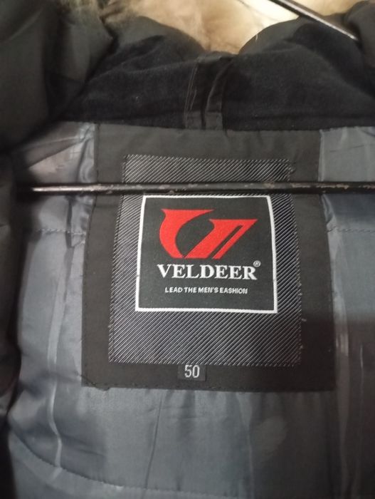 Продаётся Теплая и удобная куртка пуховик