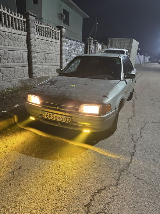 Mazda 323 седан продам