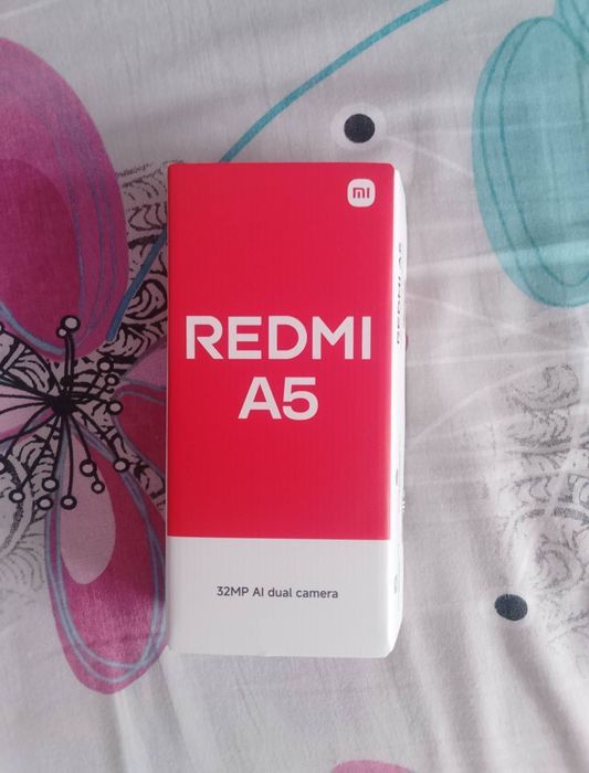 Vand telefon Redmi A5