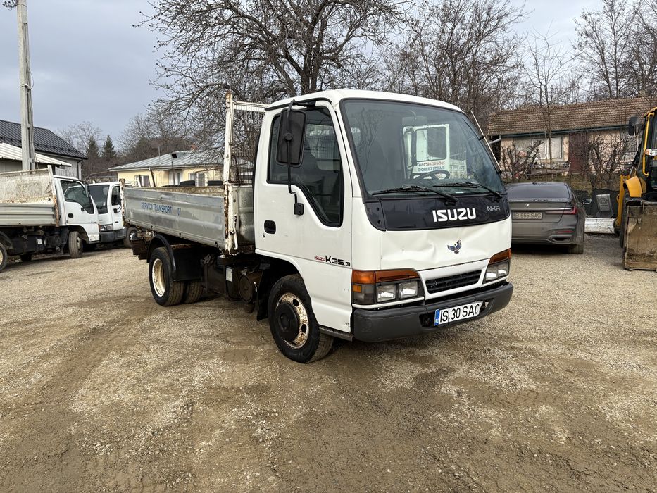 Isuzu basculabil pe 3 parti cu basculate pe hartie