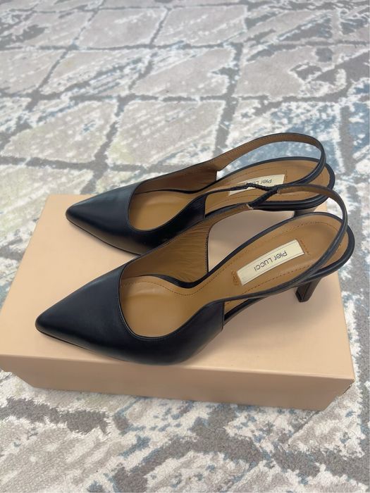 Продам кожанные босоножки