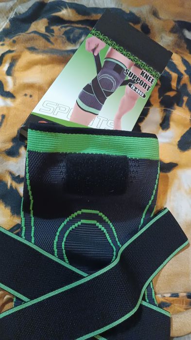 На колено фиксатор