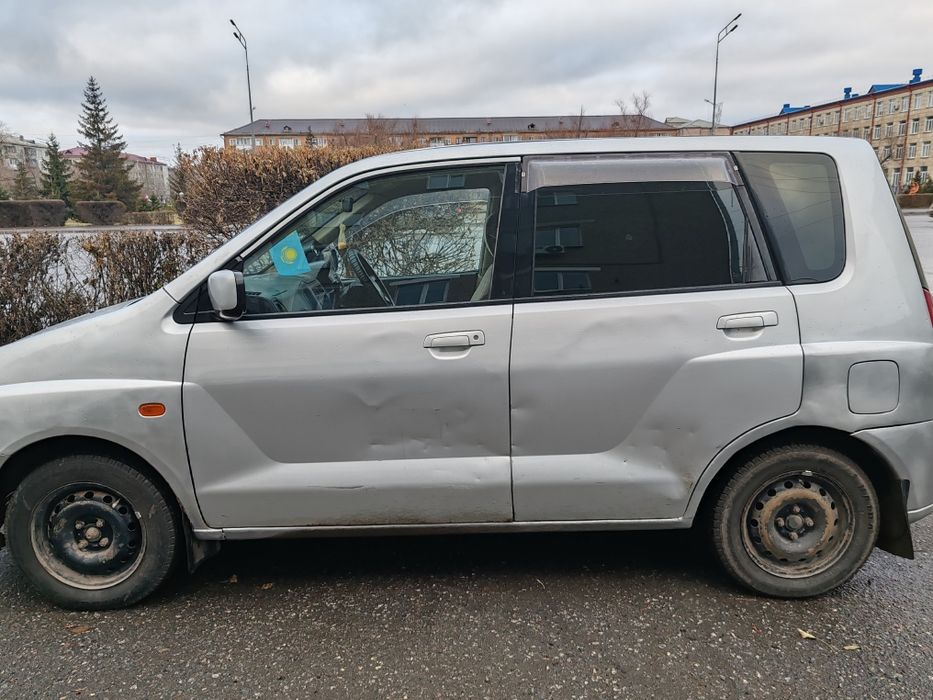 Митсубиси мираж динго