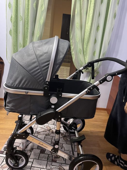 Коляска в сером цвете