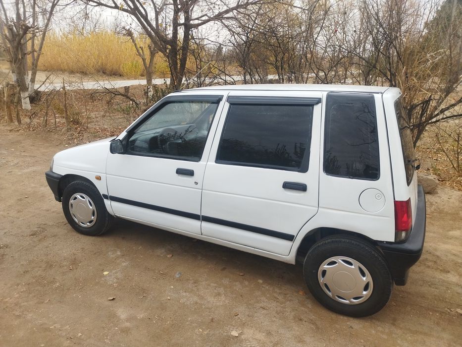 tico  1997 yil gazda