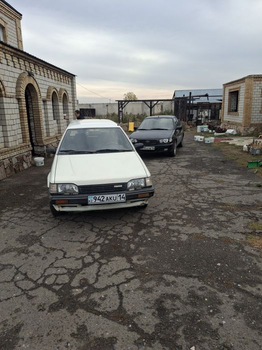 Продам машину мазда 323