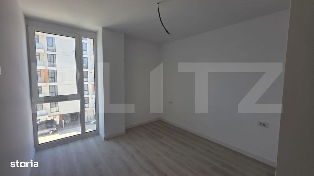 Apartament 2 camere, decomandat, etaj 3, parcare subterana inclusa