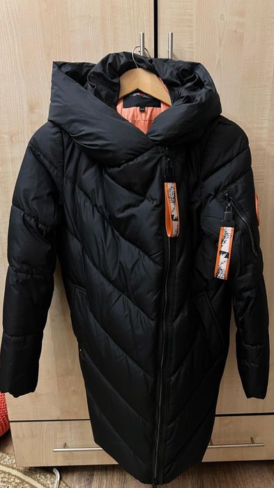 Продам  пуховик б/у