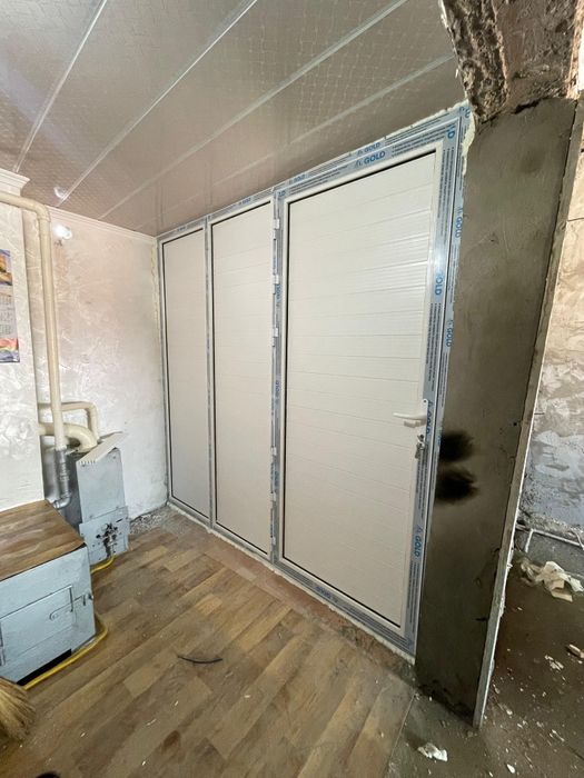 Пластиковые балконы двери окна