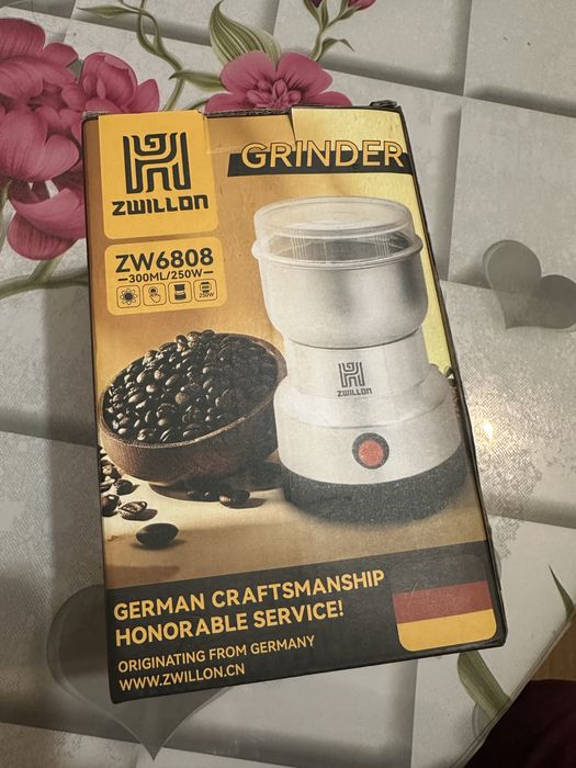 Электрическая кофемолка