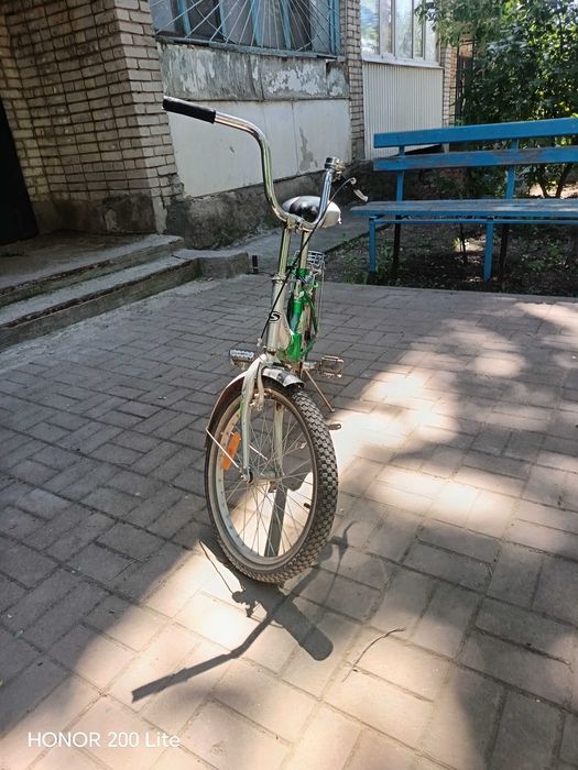 Велосипед STELS зеленого цвета