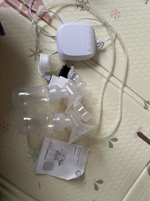 Электрический молокоотсос