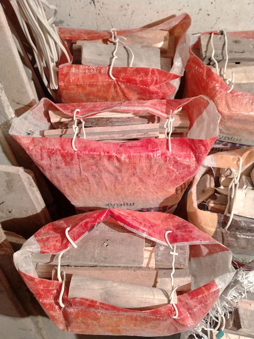 Дрова сухие в мешках