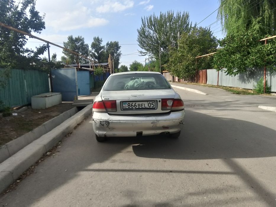 Мазда кронос       .