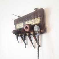 Colectie de sase pipe cu suport de perete