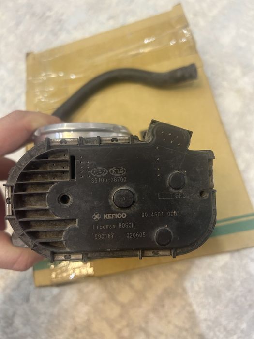 Дросельная заслонка