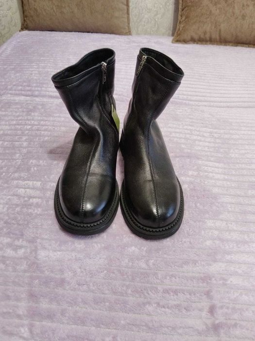 Продам новые сапоги