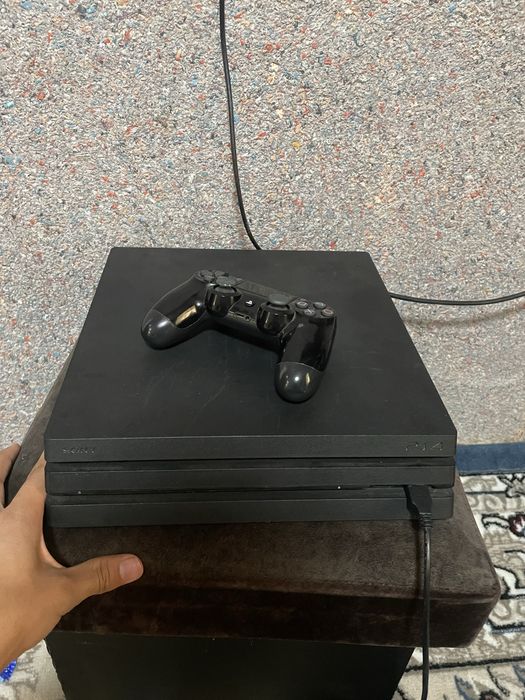 Play station 4 pro yangi 1 qol xotira 1 tb karobka dakument
