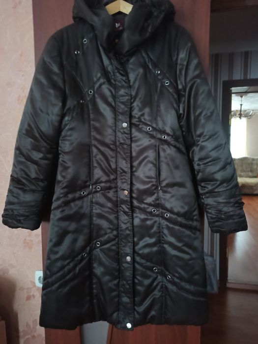 Продам женский пуховик.