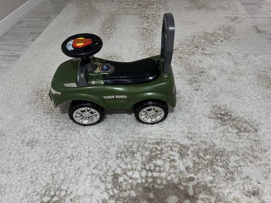 Толокар с музыкальным рулем