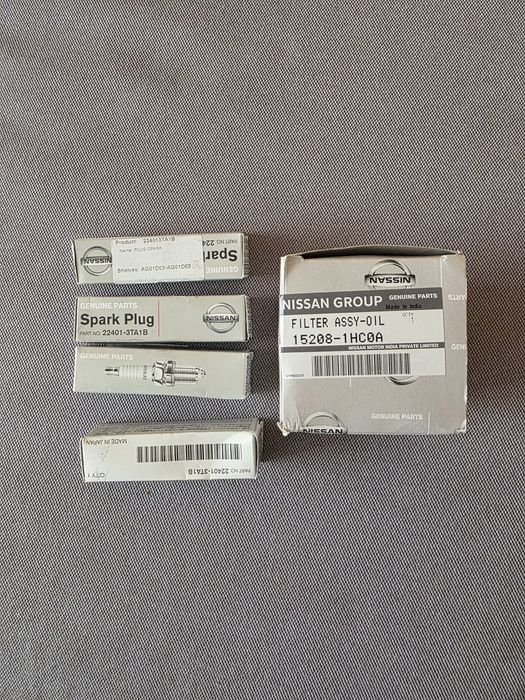 ПРОМОЦИЯ - Продавам 4броя Запалителни Свещи и Маслен филтър за Нисан