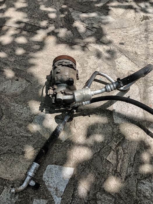 Компресор за климатик сеат