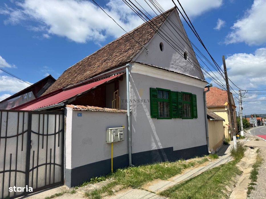 Casă la țară cu teren generos în satul Ruși