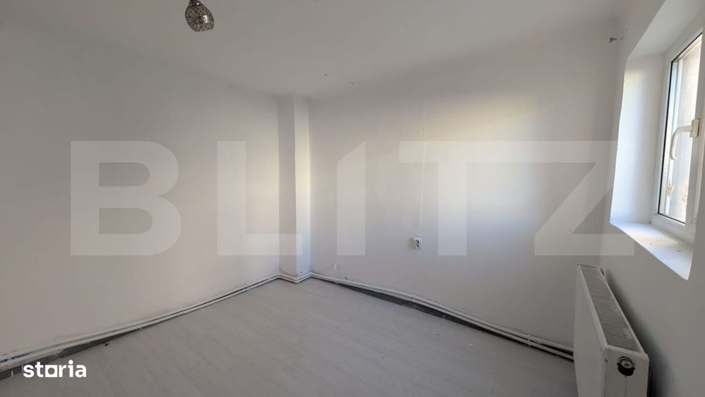 Casa cu 2 camere si mansarda ,plus bucatarie de vara .