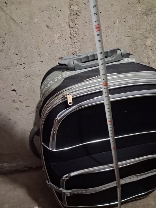 Пътнически куфар с колелца