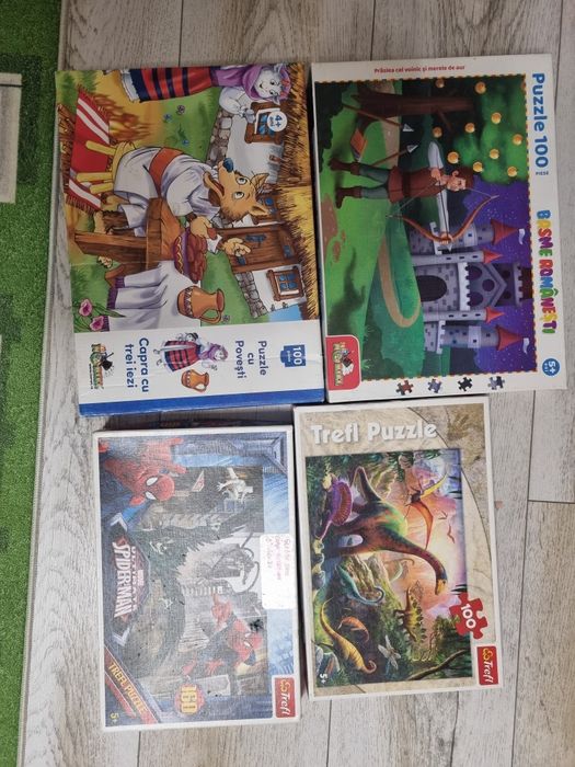 Vand 4 puzzle -uri Spiderman,  Dinozauri, Prâslea si Capra cu 3 iezi