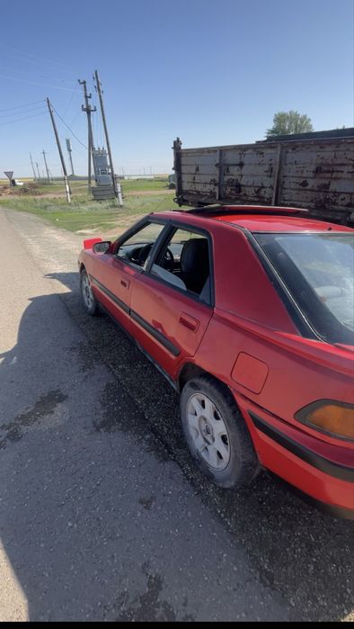 Mazda 323 слепая