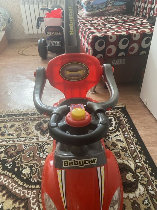 Машинку детскую продам