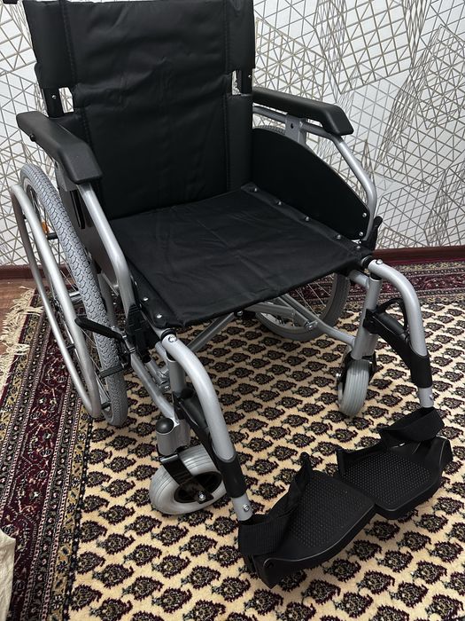 Инвалидная коляска